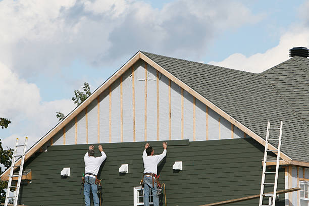 Professional Emergency Siding Repair technician working in Centerport, NY